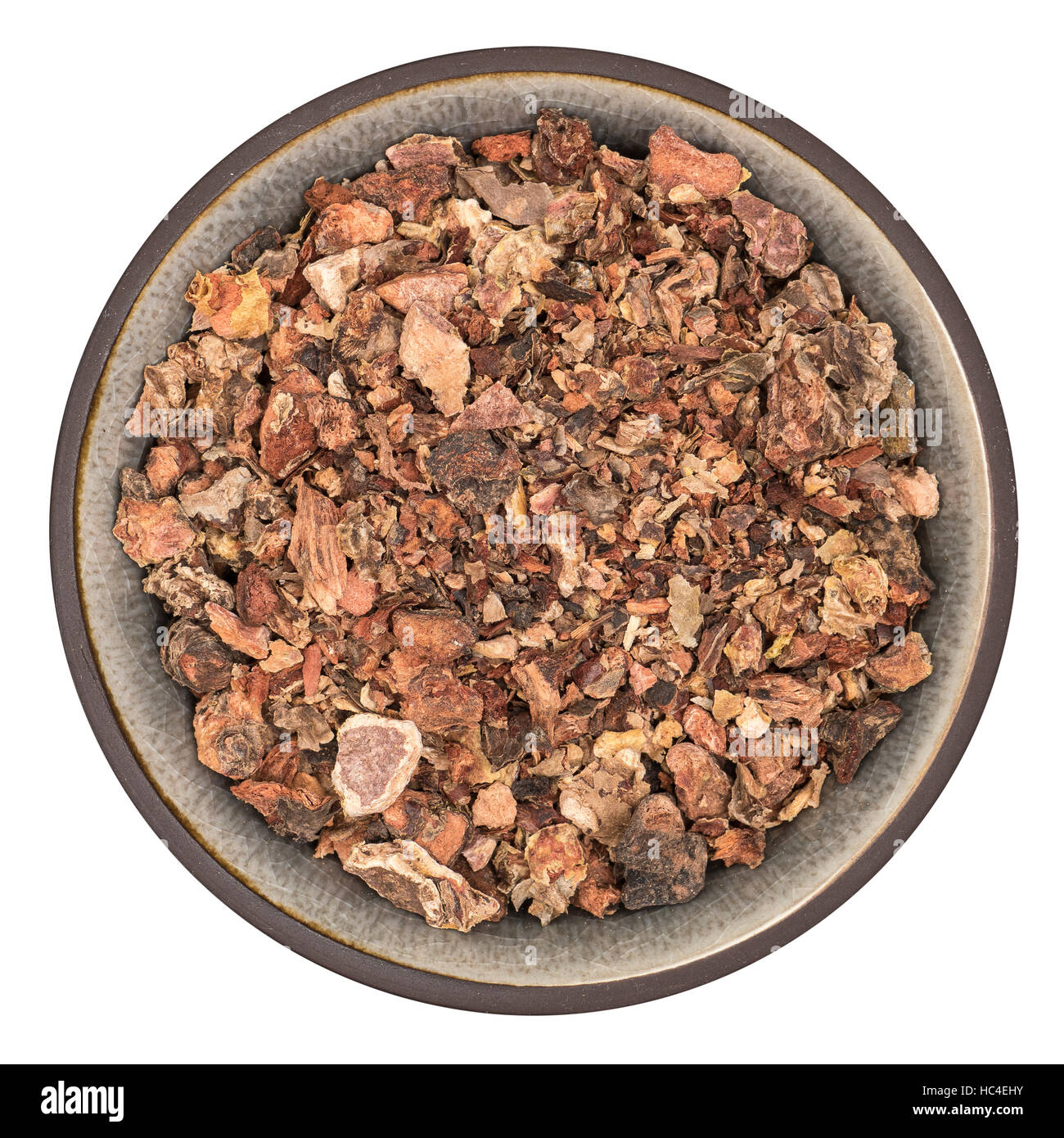 Organici di Rhodiola rosea radice nel recipiente superiore isolata Foto Stock