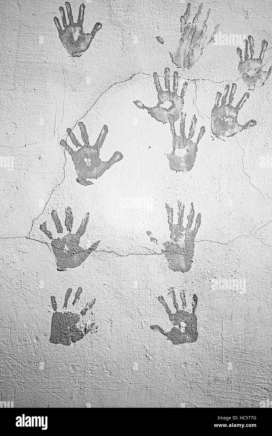 Tracce di nero parete urbani simbolo Mano Foto Stock