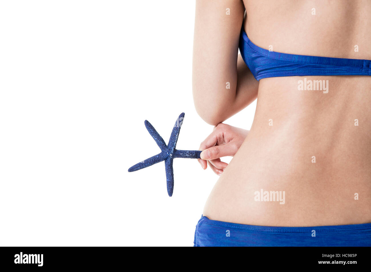 Retro della giovane donna sottile linea corpo in bikini Foto Stock