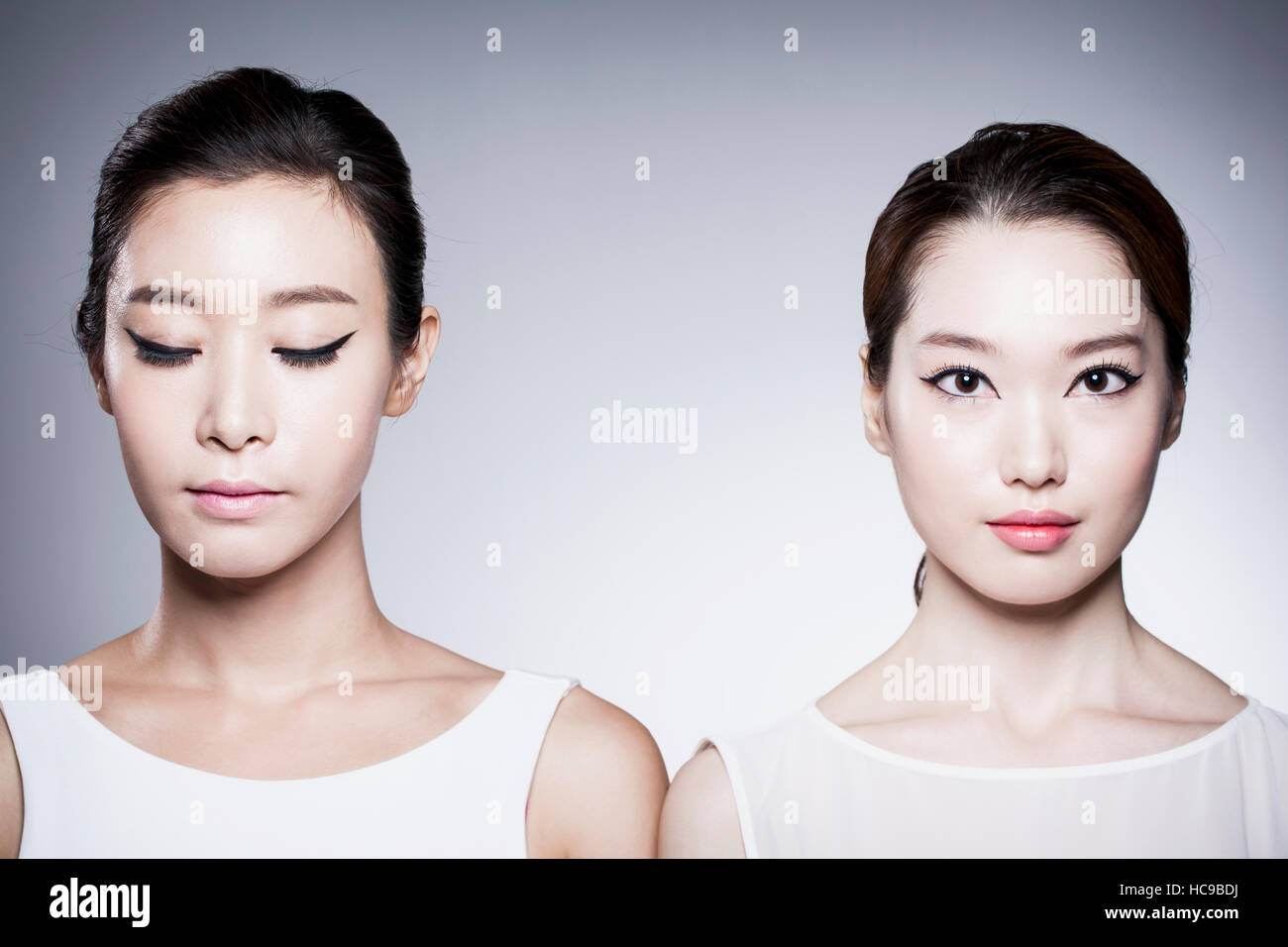 Ritratto di due giovani belle le donne coreane Foto Stock