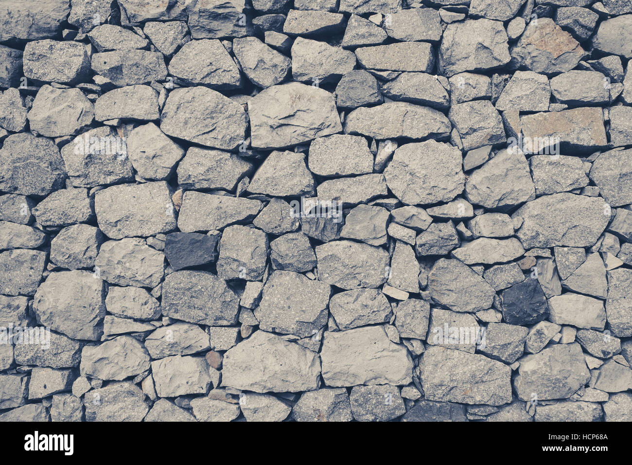 Muro di pietra naturale texture - sfondo rock Foto Stock