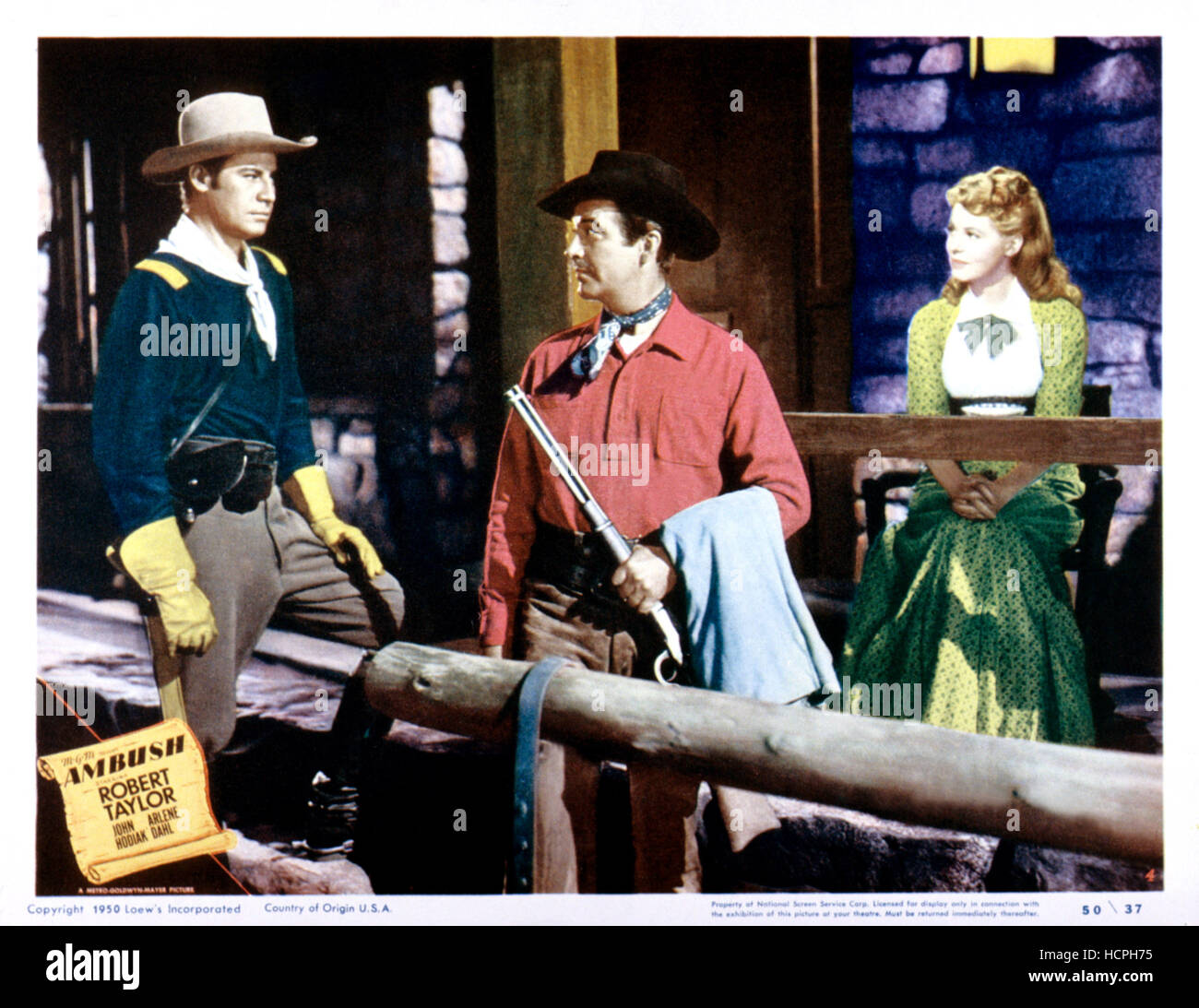 Imboscata, l-r: Don Taylor, Robert Taylor, Arlene Dahl su lobbycard, 1950. Foto Stock