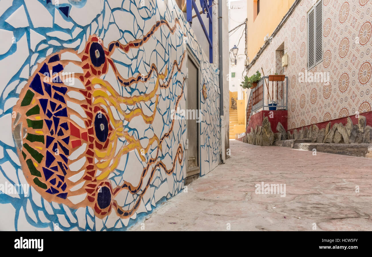 Parete piastrellata texture di sfondo sulle pareti delle case in Puerto Mogan, Gran Canaria, Spagna Foto Stock