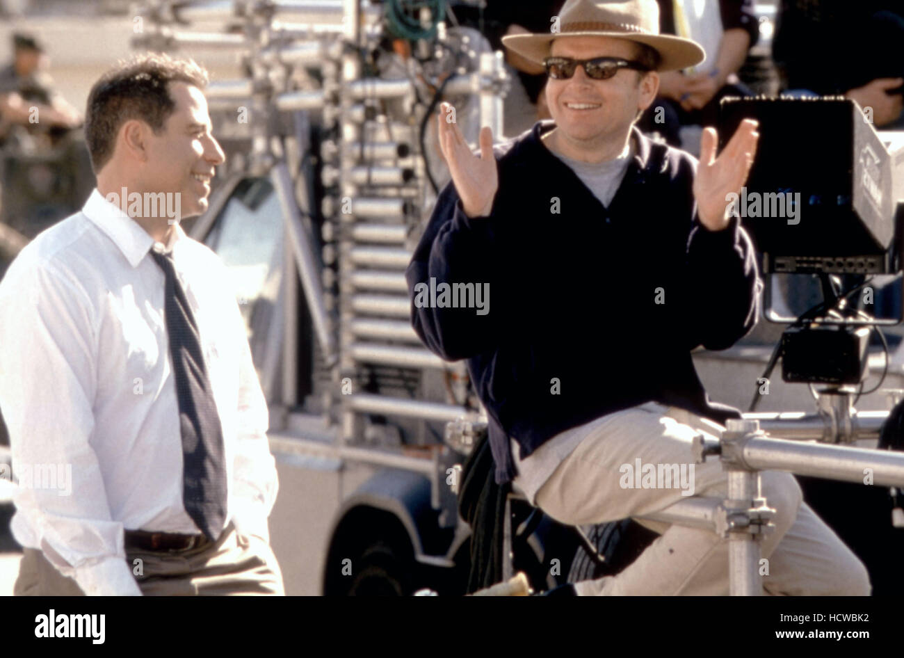 Il generale della figlia, John Travolta, direttore Simon West sul set, 1999, (c)Paramount/cortesia Everett Collection Foto Stock