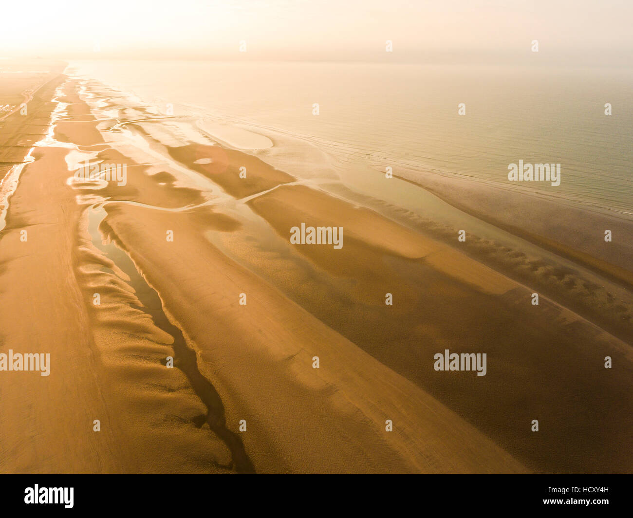 Camber Sands Beach a sunrise, campanatura, nei pressi di segale, East Sussex, Regno Unito Foto Stock