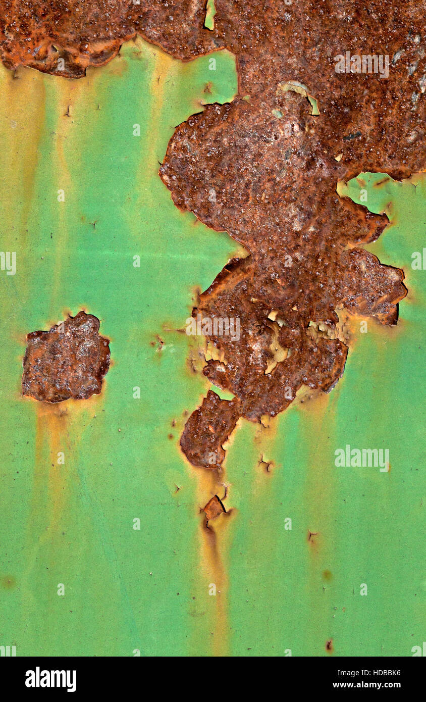 Close-up di peeling la vernice e la ruggine su una parete Foto Stock