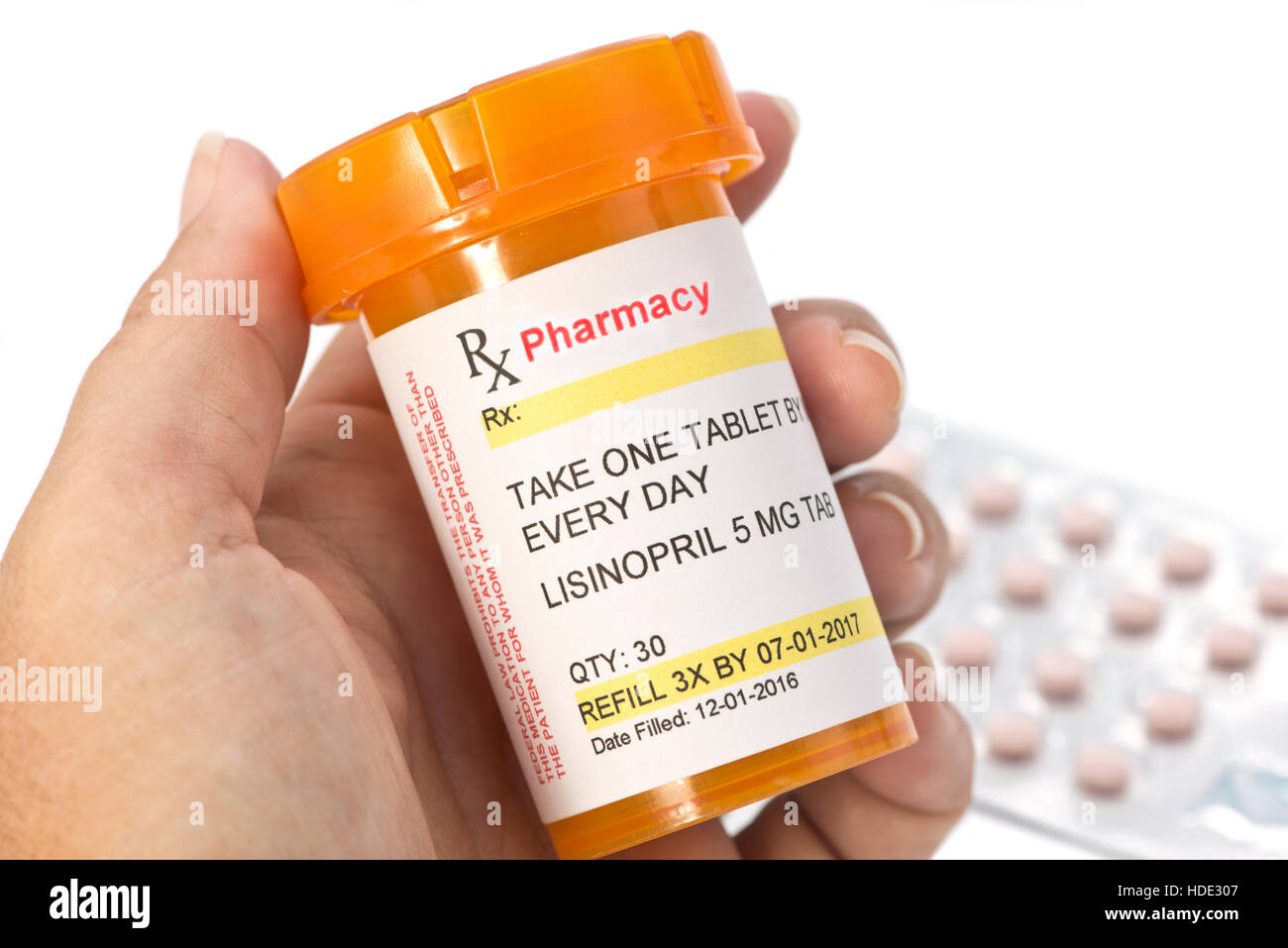 Lisinopril bottiglia di prescrizione e blister. L'idrocodone è un nome generico del farmaco, l'etichetta creata dal fotografo. Foto Stock