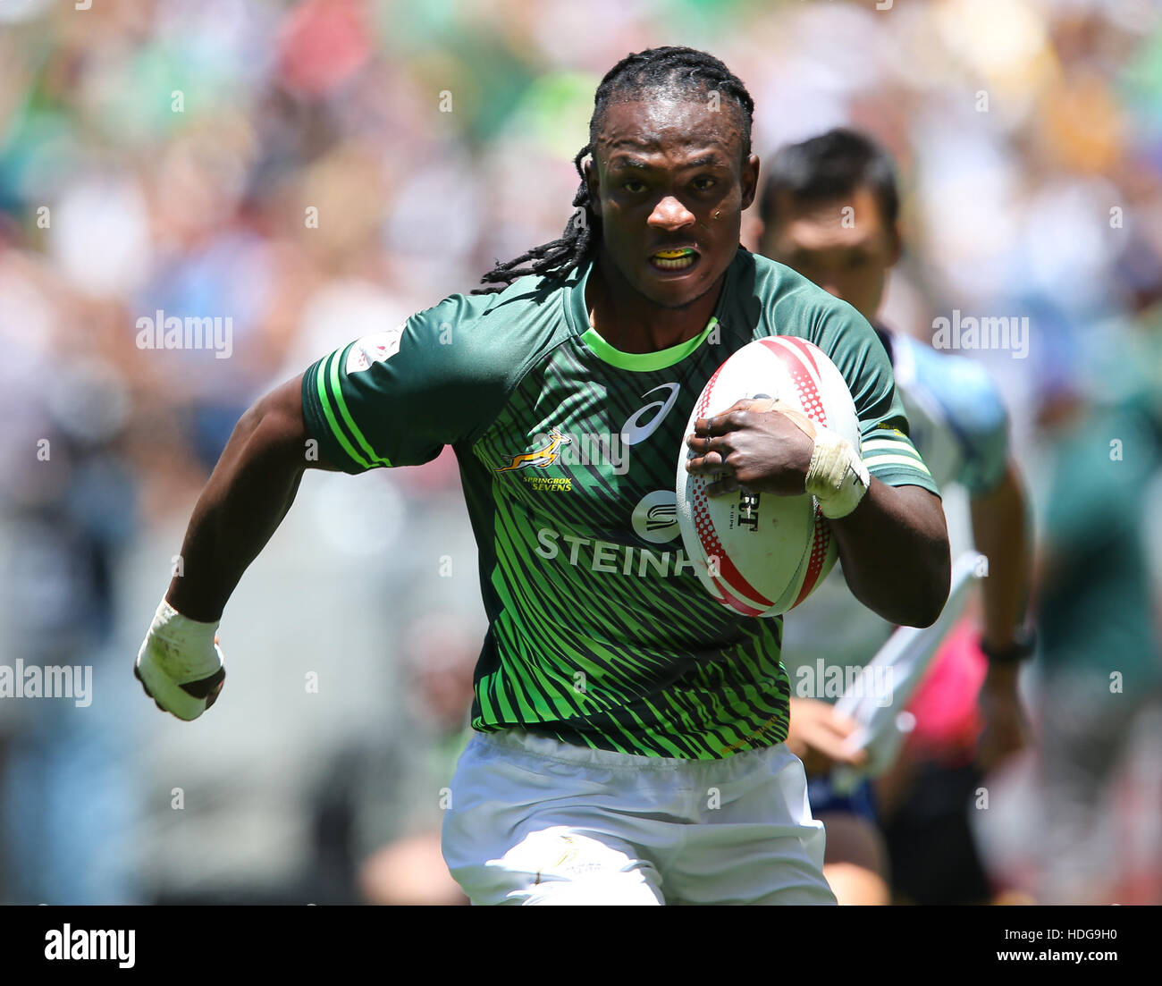La SA Rugby Sevens Springbok i giocatori in azione durante il 2016 HSBC sette torneo al Cape Town Stadium nel punto verde Punto, Cape Town. Foto Stock