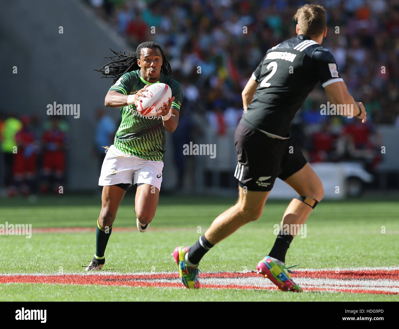 La SA Rugby Sevens Springbok i giocatori in azione durante il 2016 HSBC sette torneo al Cape Town Stadium nel punto verde Punto, Cape Town. Foto Stock