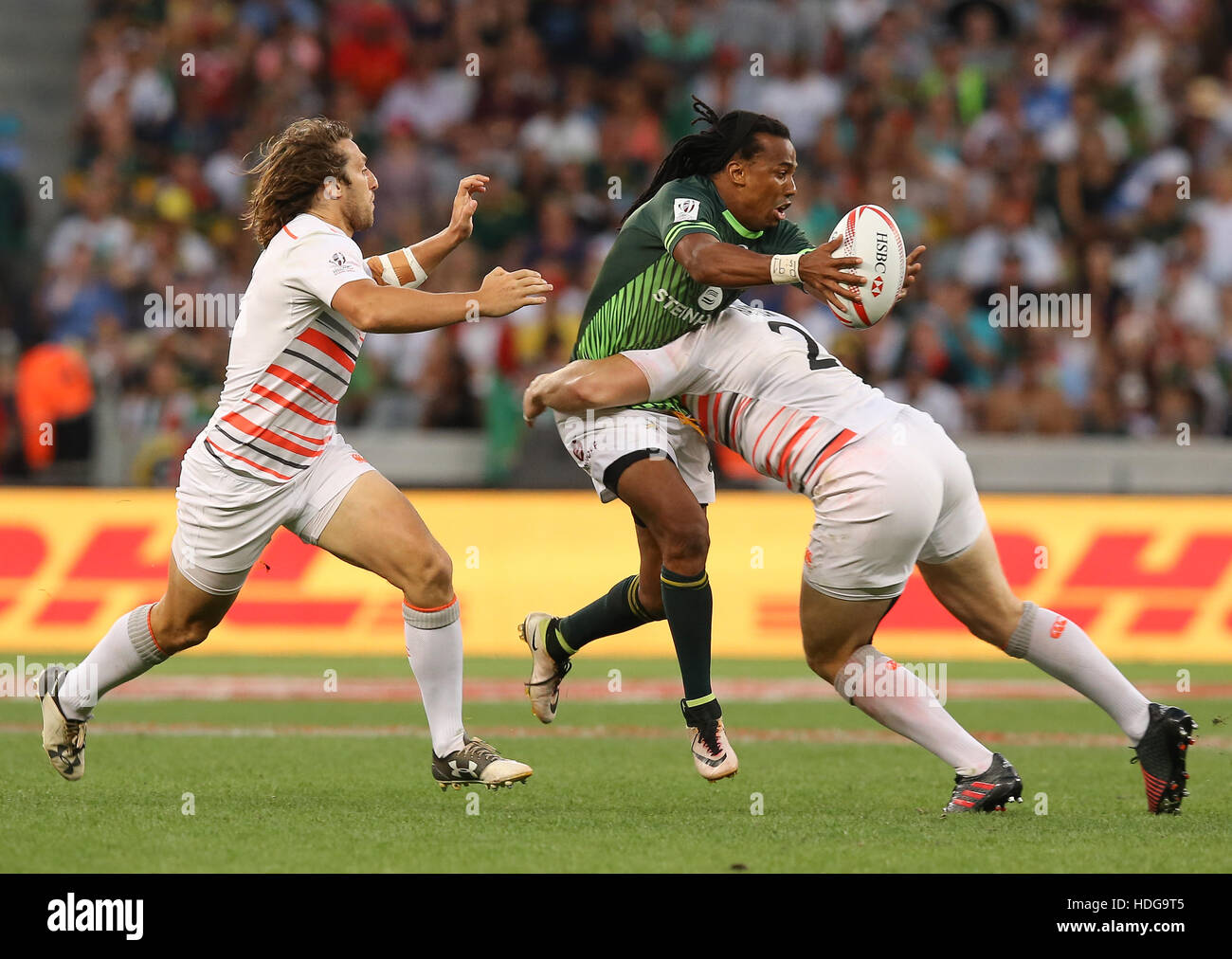 La SA Rugby Sevens Springbok i giocatori in azione durante il 2016 HSBC sette torneo al Cape Town Stadium nel punto verde Punto, Cape Town. Foto Stock