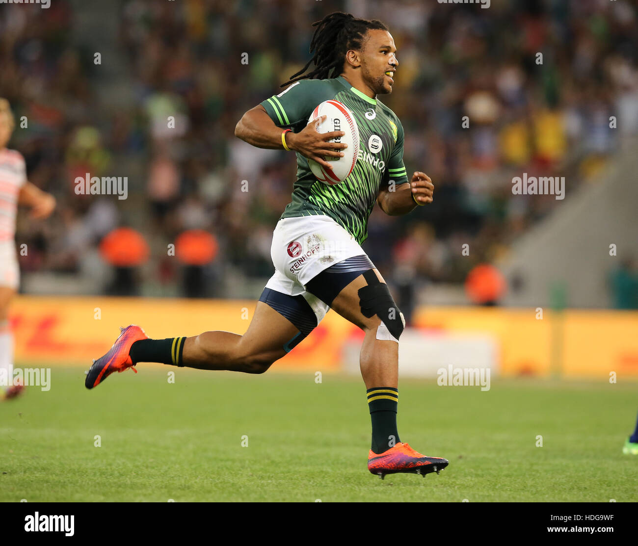 La SA Rugby Sevens Springbok i giocatori in azione durante il 2016 HSBC sette torneo al Cape Town Stadium nel punto verde Punto, Cape Town. Foto Stock