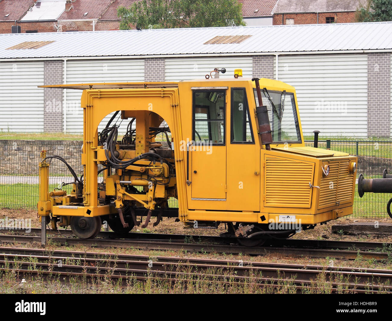 Questa immagine raffigura un Bourreuse, un tipo di attrezzatura meccanica utilizzata per la costruzione di strade o l'estrazione mineraria, visto presso il sito CFV3V. I macchinari fanno parte dei progressi industriali all'inizio del XX secolo. Foto Stock