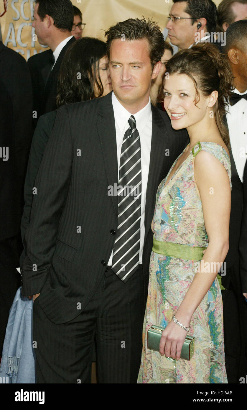 Matthew Perry e Rachel Dunn alla Screen Actors Guild Awards di Los Angeles, la California il lunedì 22 febbraio, 2004. Photo credit: Francesco Specker Foto Stock