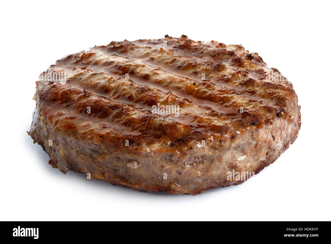 Unico hamburger grigliati patty isolato su bianco. Foto Stock