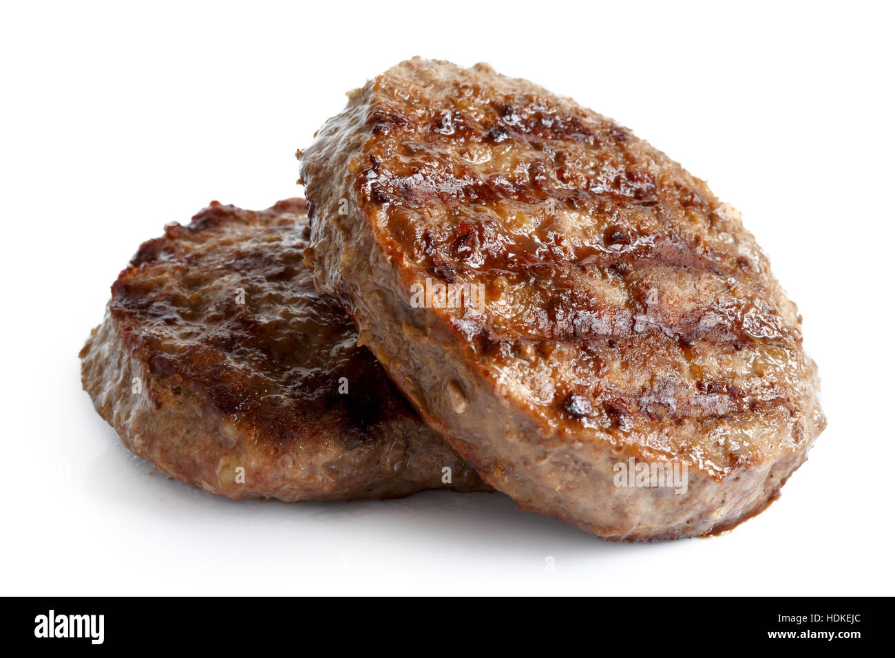 Due hamburger grigliati polpette isolato su bianco. Foto Stock