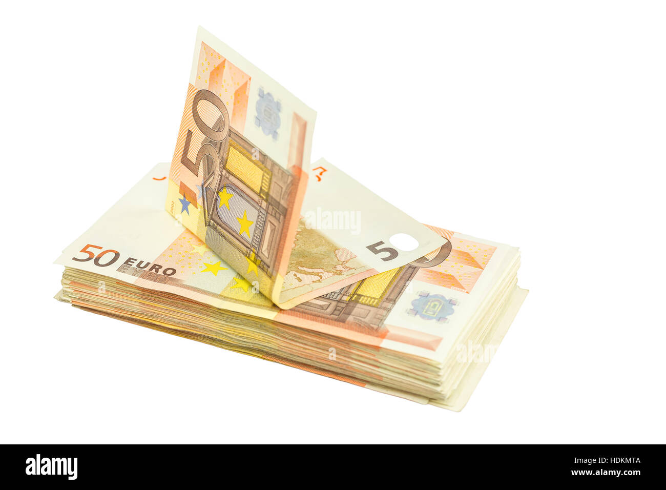 Pila di euro bills isolati su sfondo bianco Foto Stock