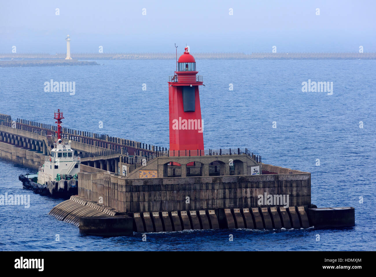 Struttura di frangionde faro, Jeju City, Jeju Island, Corea del Sud, Asia Foto Stock