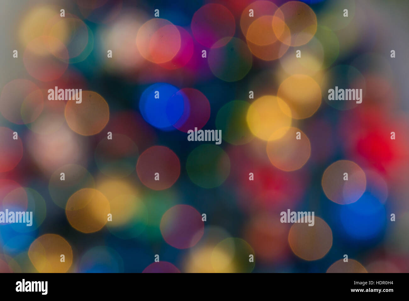 Luci bokeh sfocato sfondo dalla notte di Natale del partito per la tua progettazione, vintage o retrò dai toni di colore Foto Stock