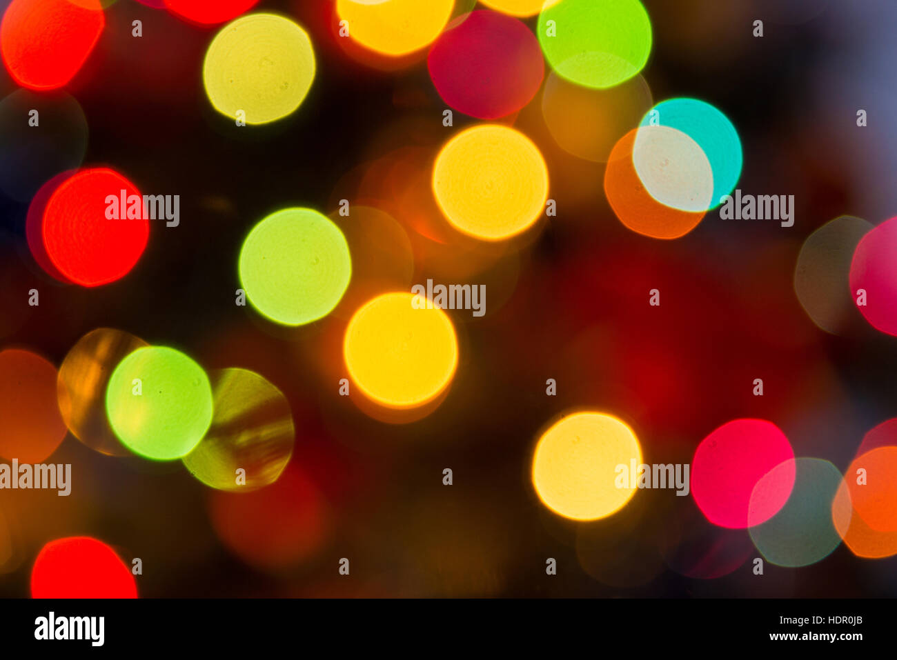 Luci bokeh sfocato sfondo dalla notte di Natale del partito per la tua progettazione, vintage o retrò dai toni di colore Foto Stock