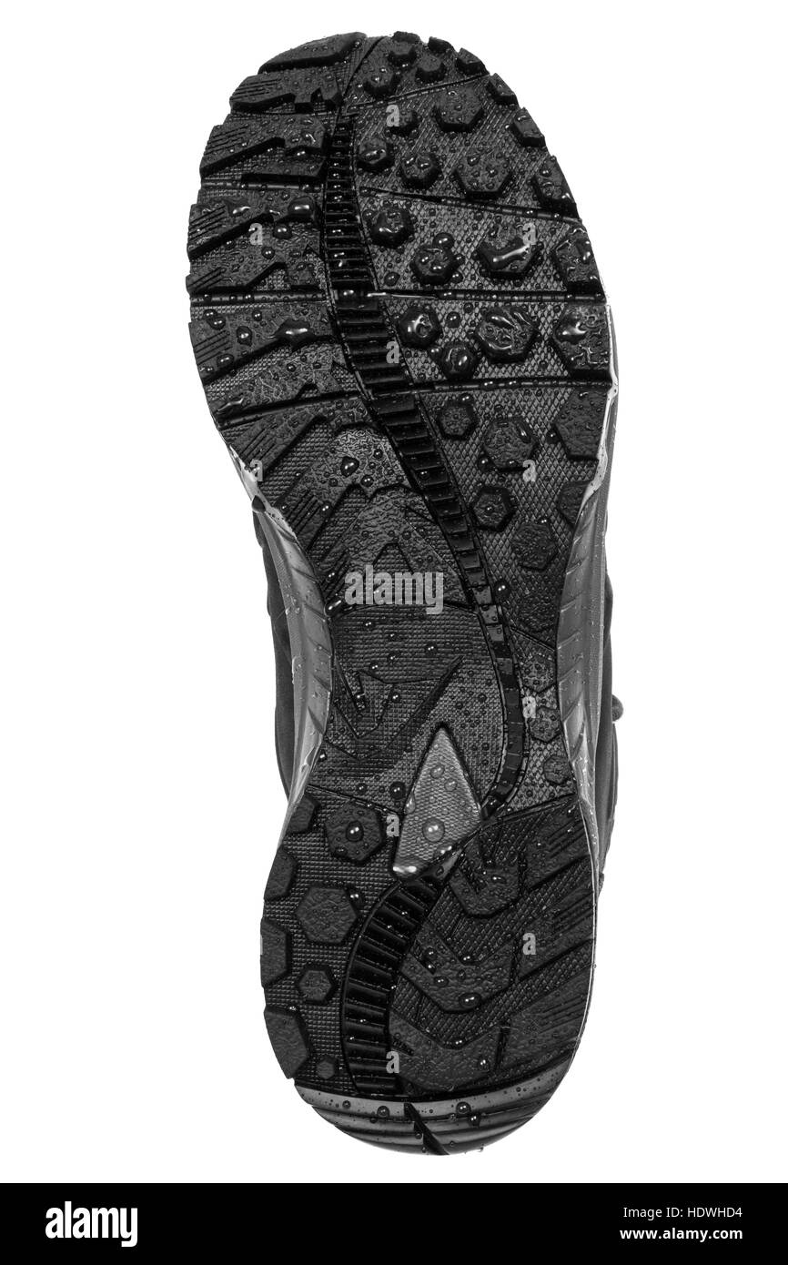 Suola scarponi su sfondo bianco Foto Stock