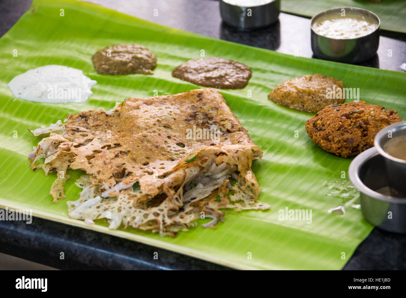 Onion rava dosa, Murugan Idli Shop, Chennai, India Foto Stock