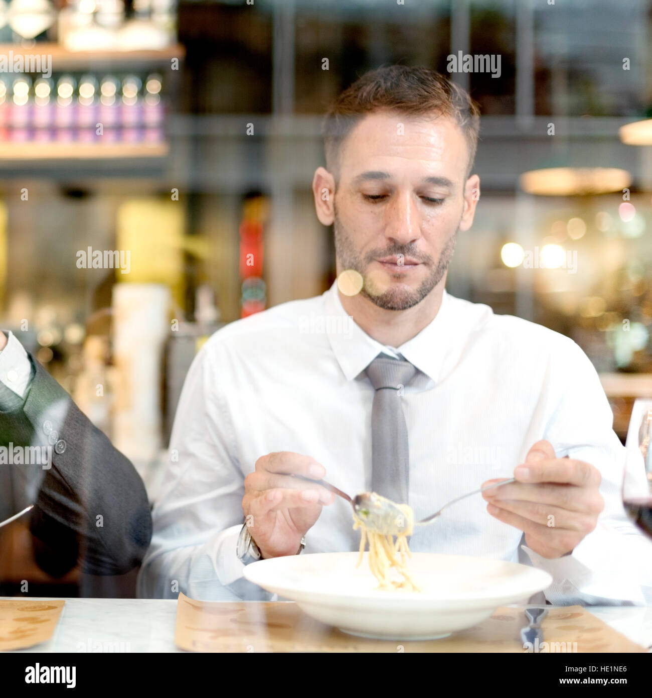 Gli uomini d' affari a pranzo ristorante di concetto Foto Stock