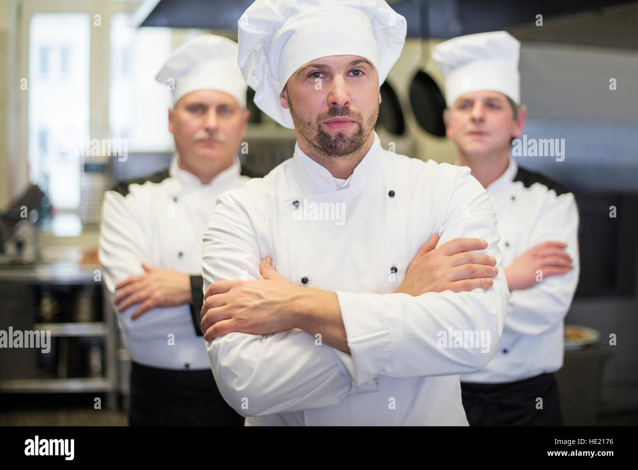 Ritratto di tre chef professionisti Foto Stock