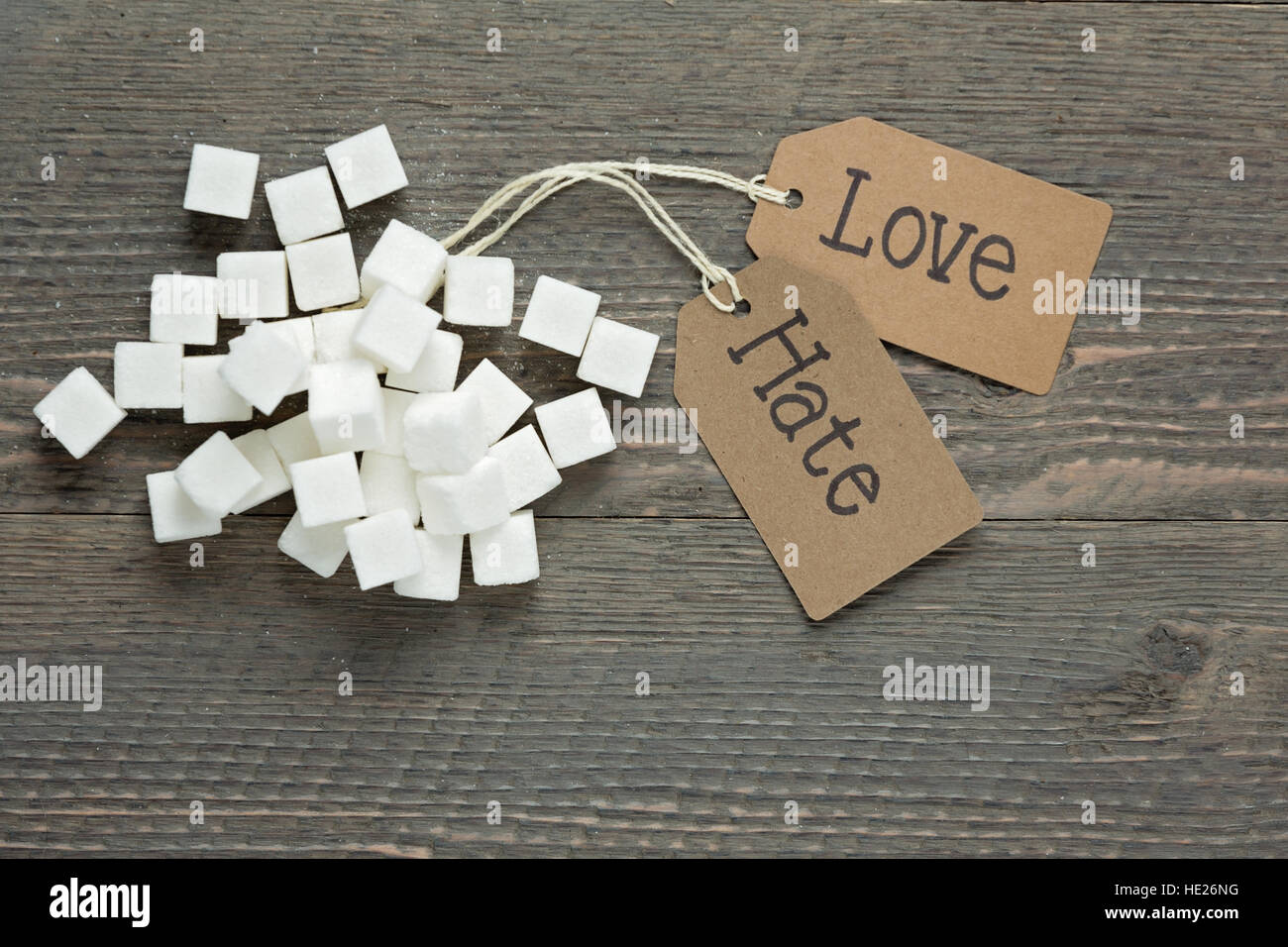 Amore contro odio per lo zucchero Foto Stock