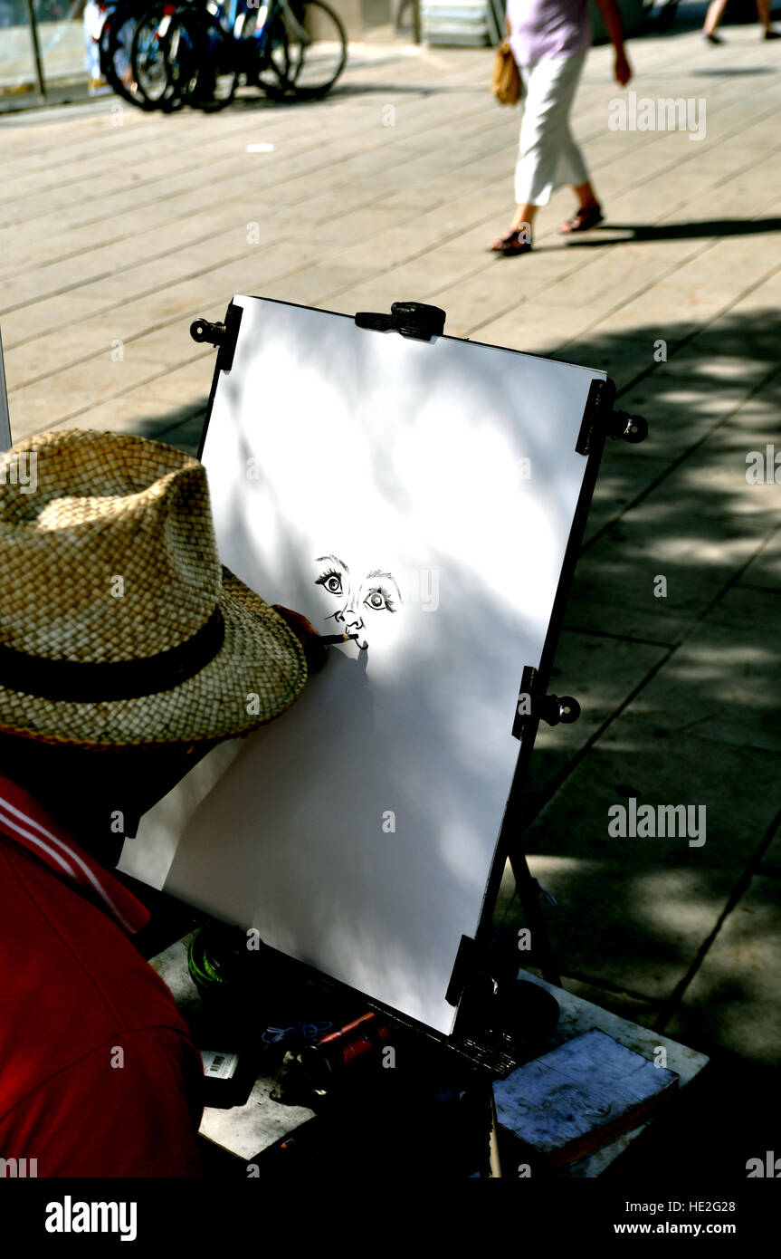 La caricatura artista il disegno di una faccia Foto Stock