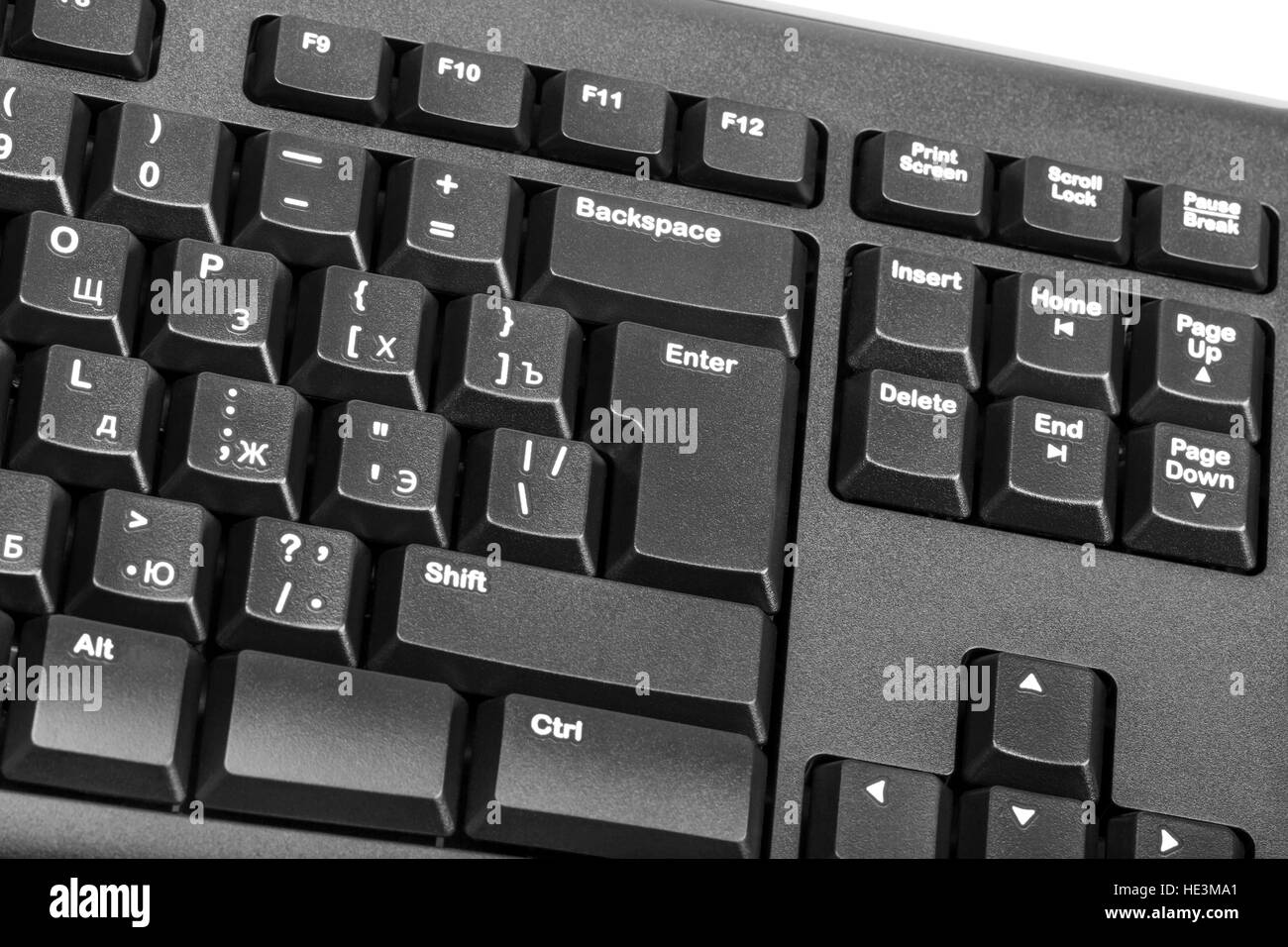 Raccolta elettronica - close-up computer nero con tastiera russa lettera e il tasto enter Foto Stock