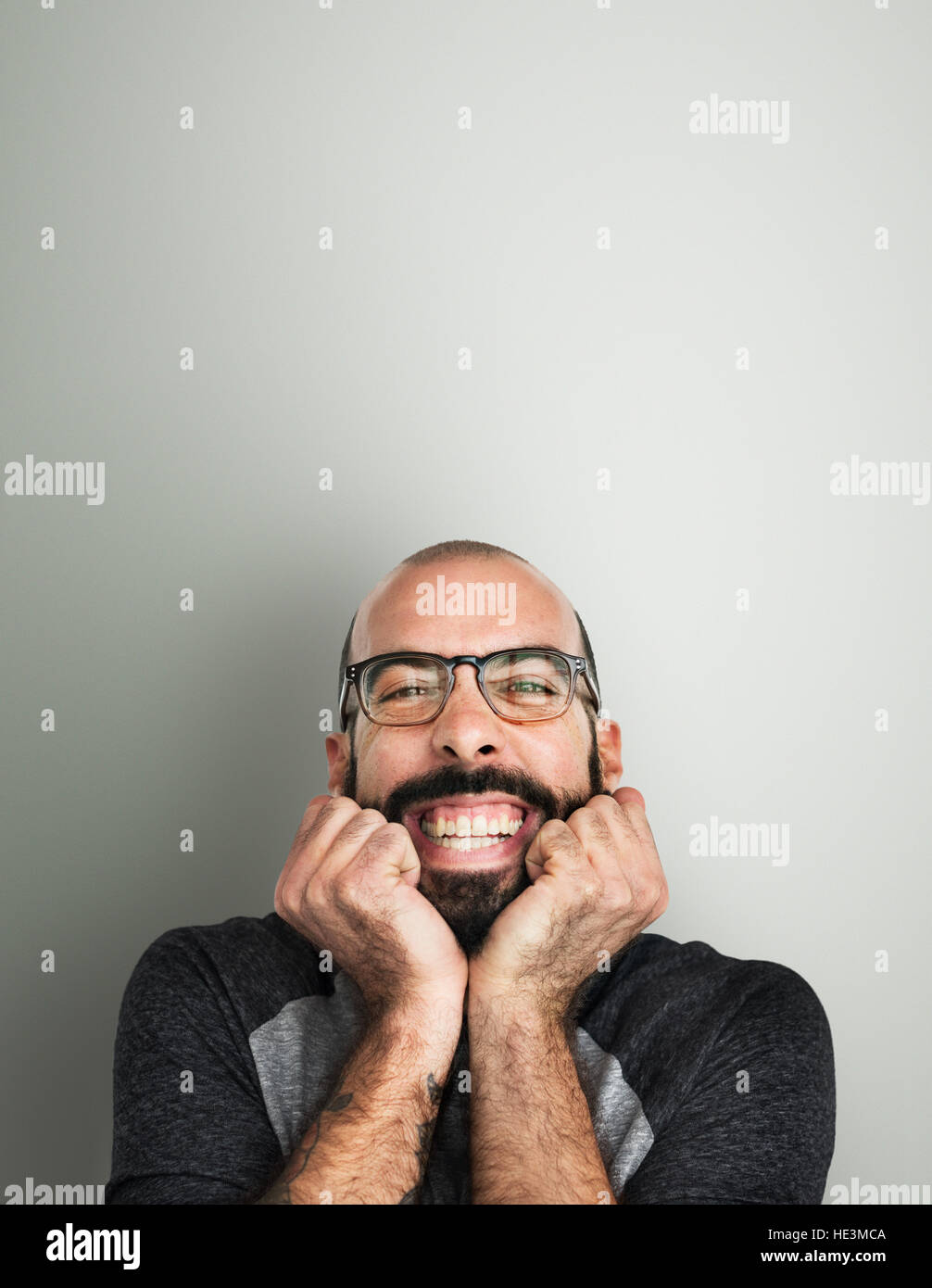 Giovane uomo sorridente felice concetto Foto Stock