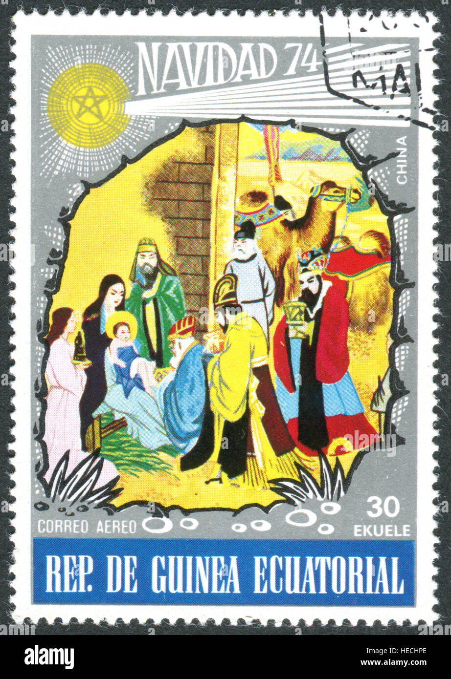 Un timbro stampato in Guinea Equatoriale, raffigura una scena biblica della Natività (Cina) Foto Stock
