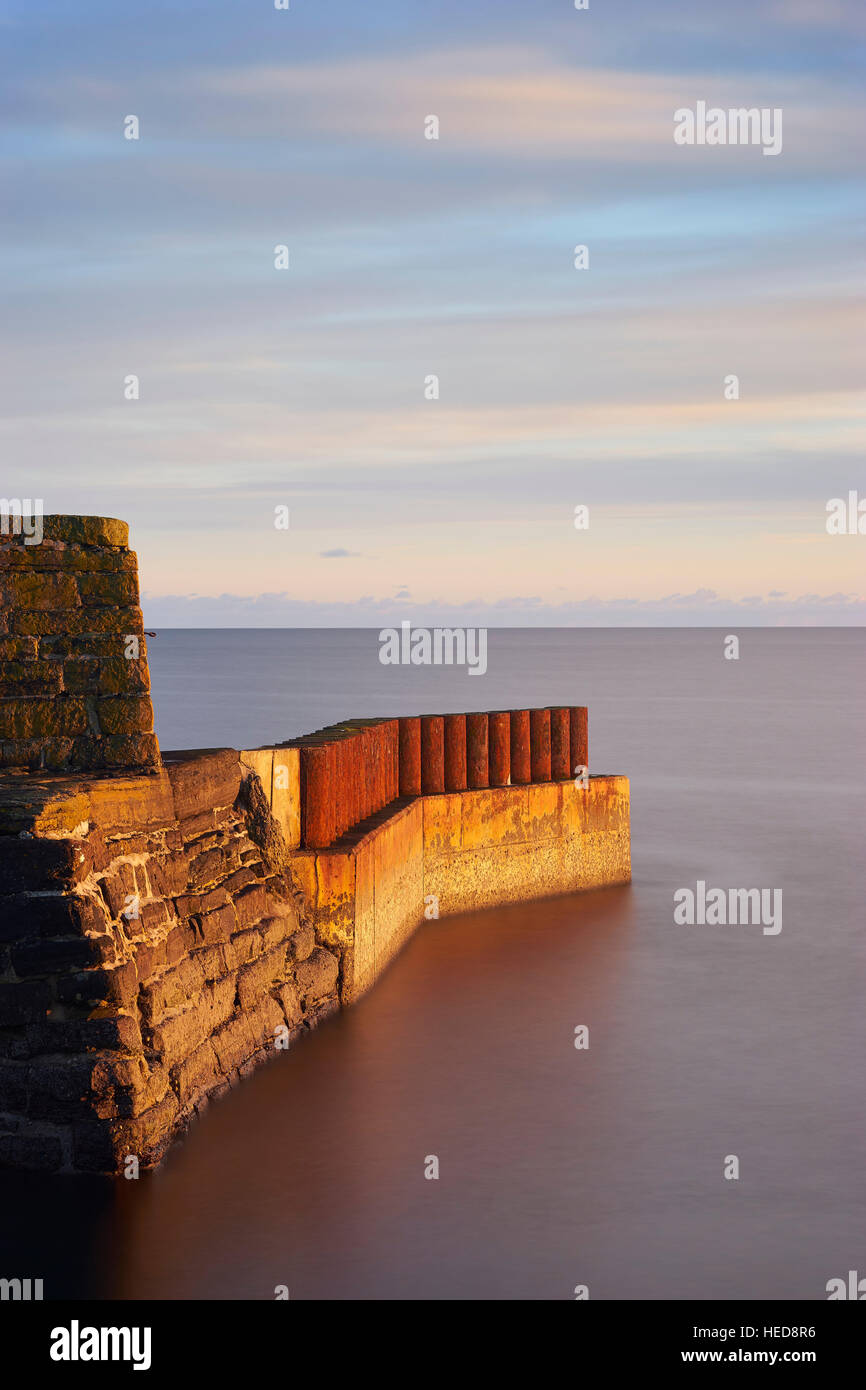 Porto Keiss al tramonto, Caithness in Scozia Foto Stock