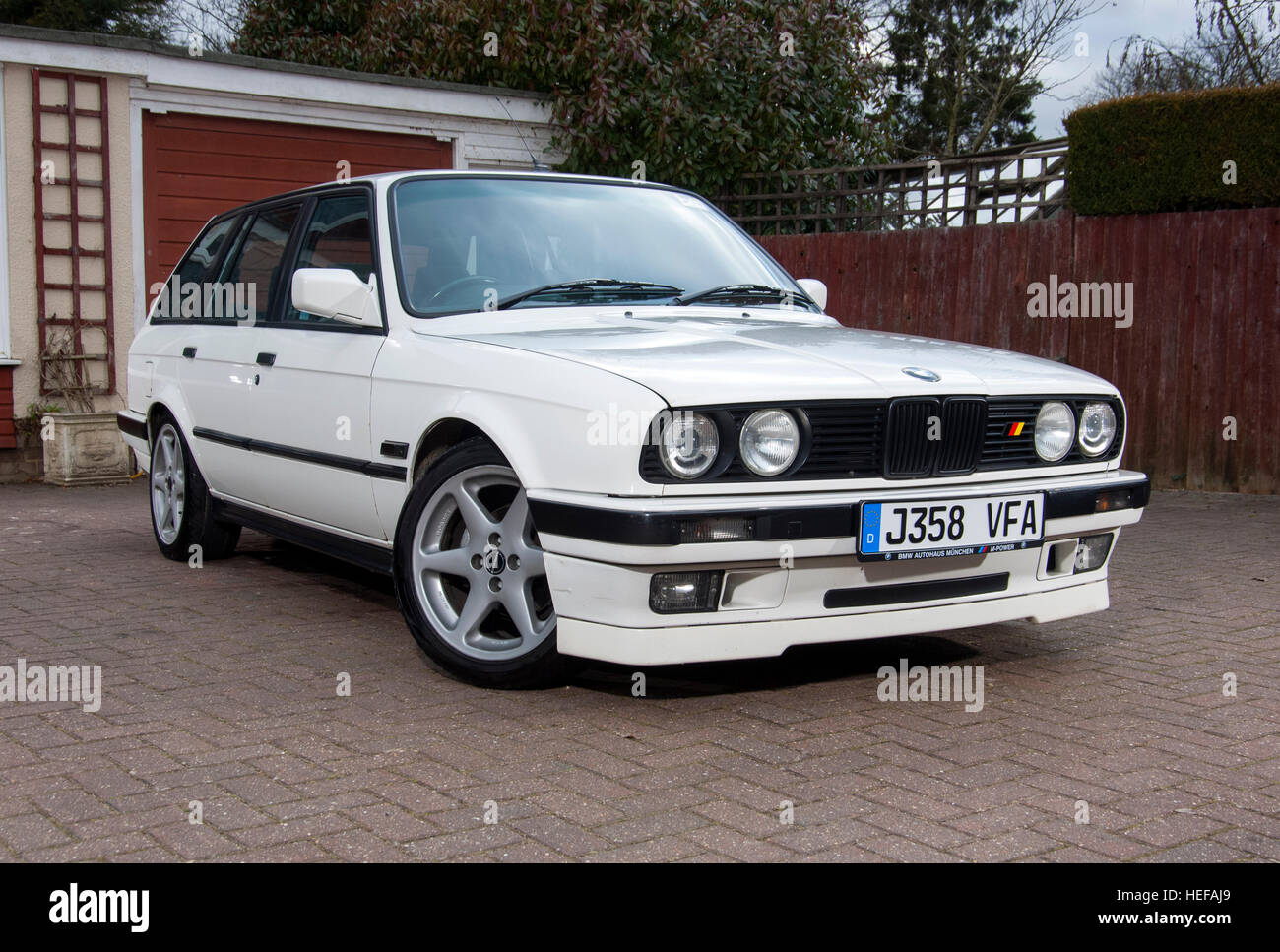 BMW E30 estate 3 Serie modern classic car Foto Stock