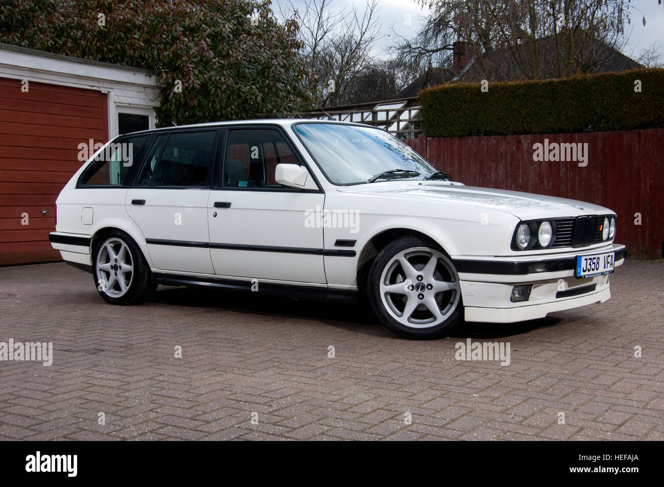 BMW E30 estate 3 Serie modern classic car Foto Stock