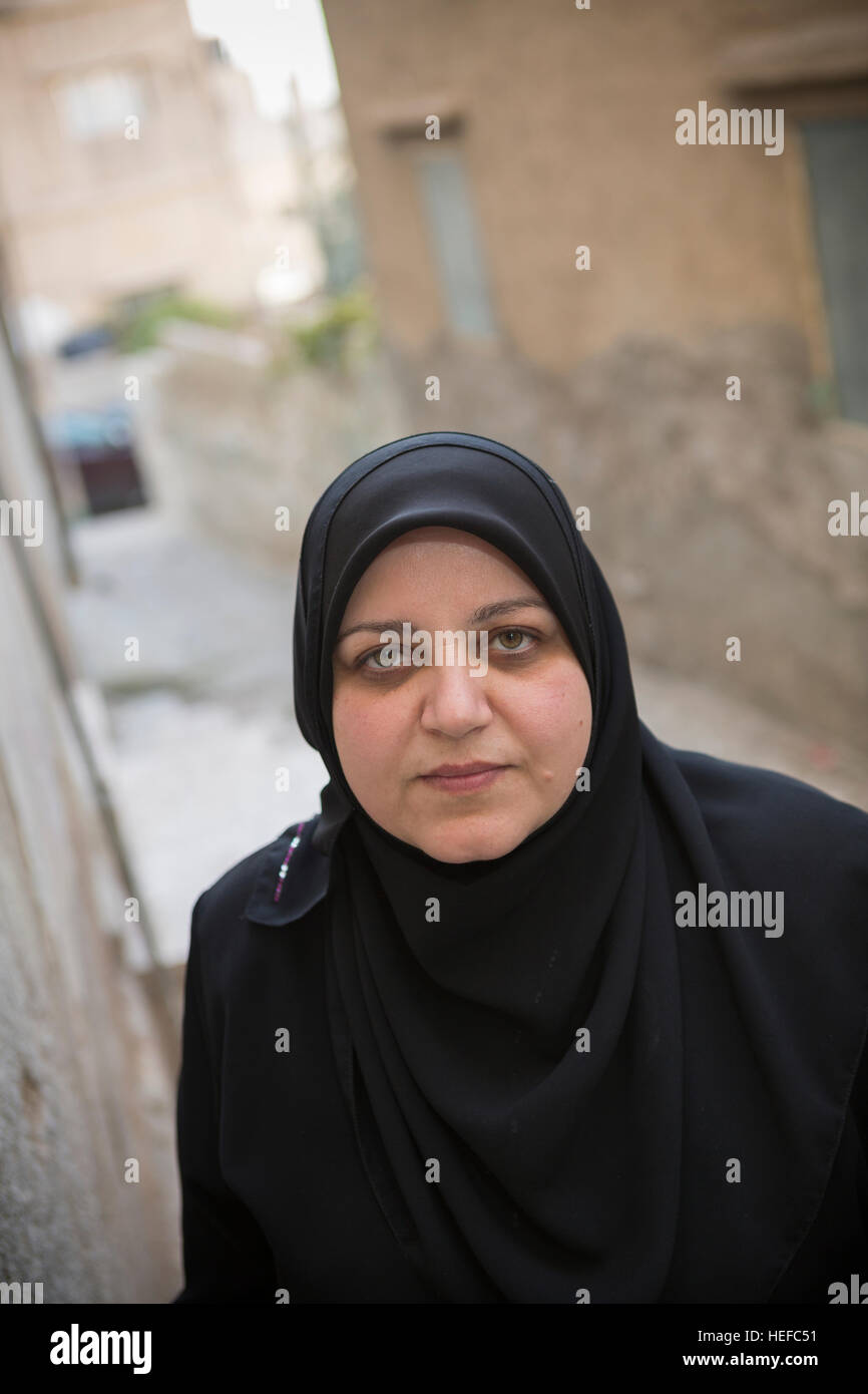 Donna giordana in Zarqa, Giordania. Foto Stock