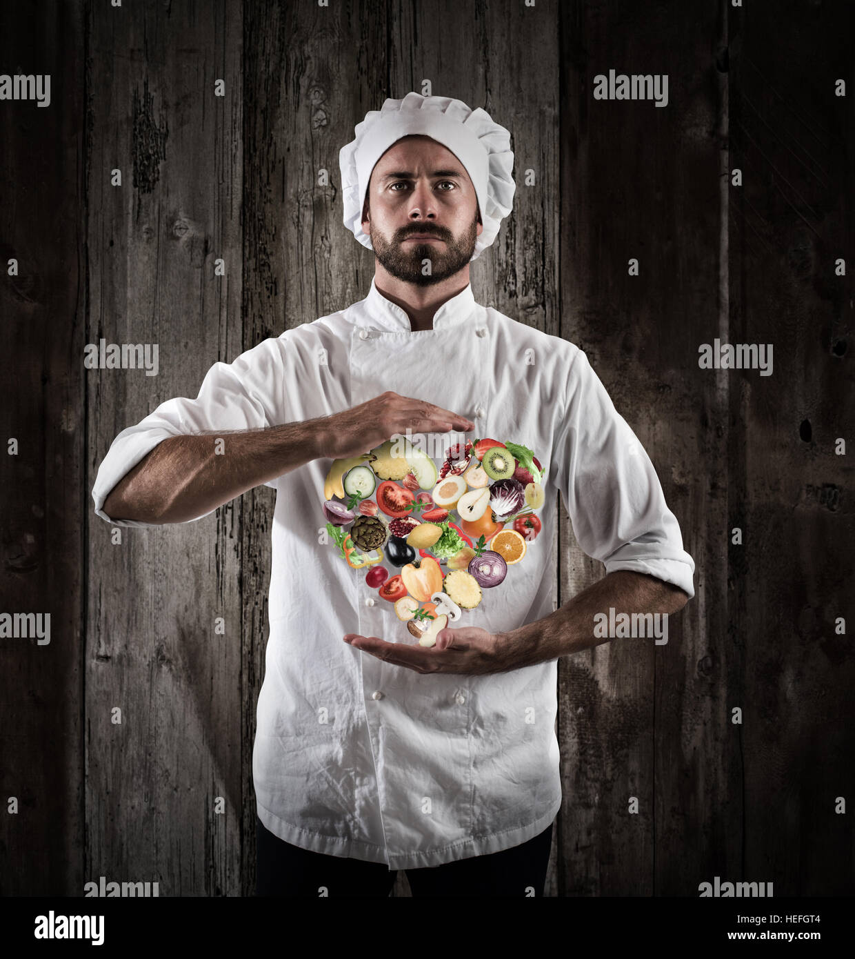 Lo chef cucina salutare Foto Stock