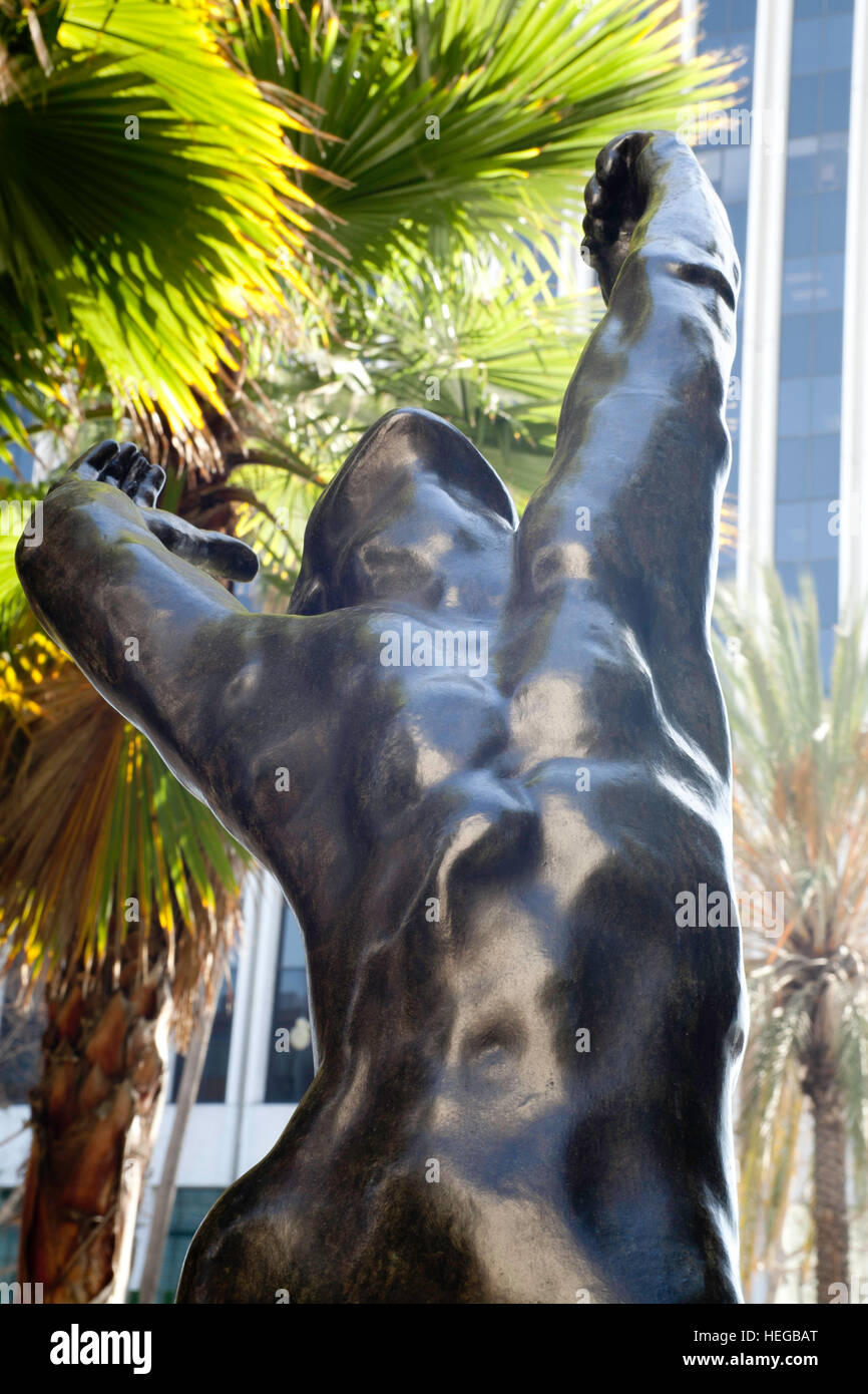 Statua virile con palm background Foto Stock