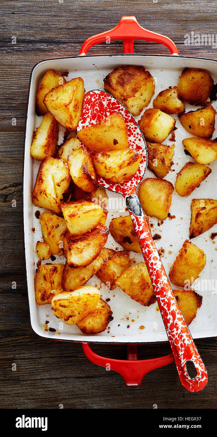 patate arrosto cucchiaio di grasso d'anatra Foto Stock