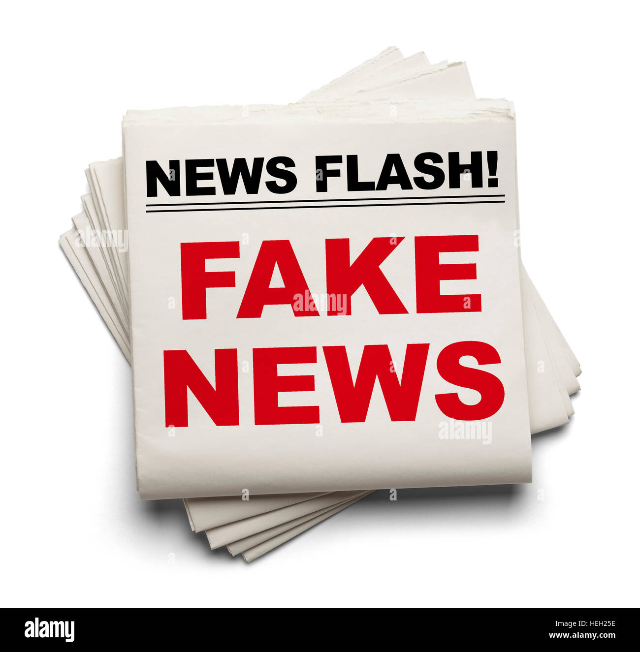 Gioco di quotidiani che dire Fake News isolato su sfondo bianco. Foto Stock