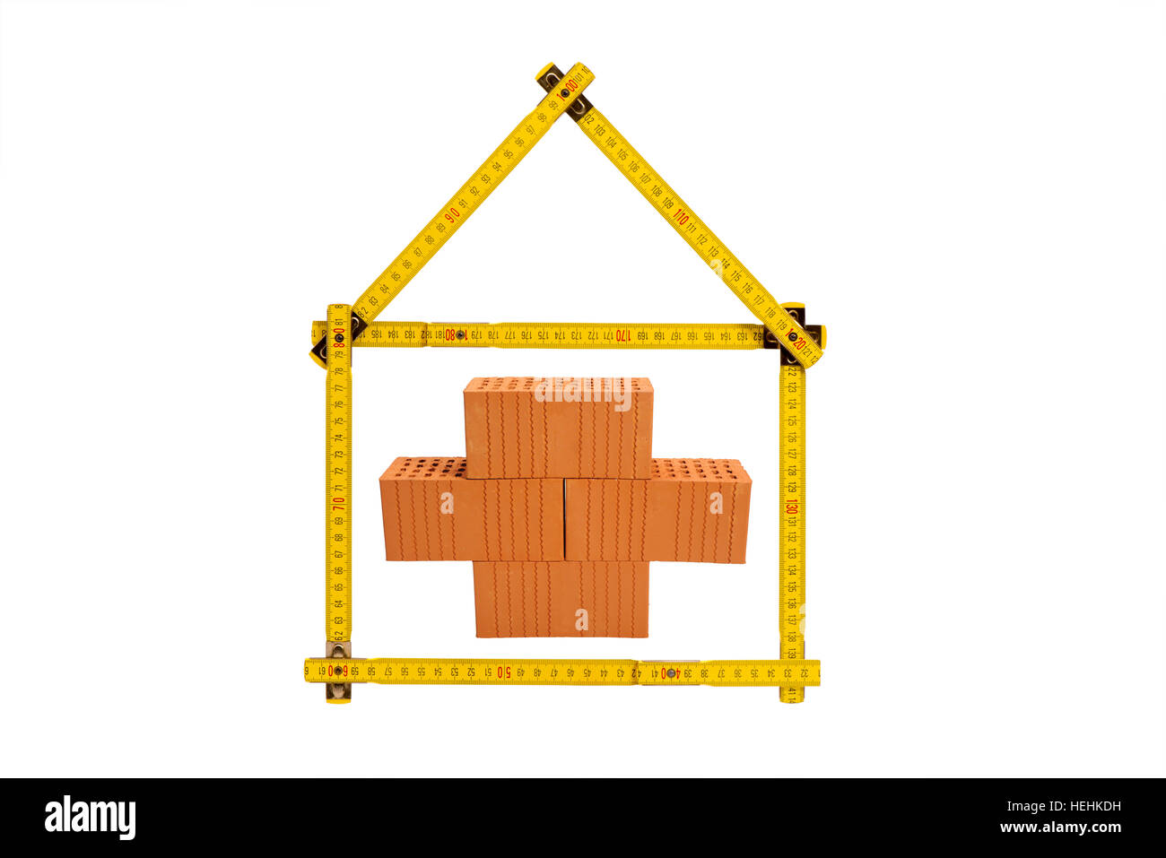 Logo per la casa e la società di costruzioni con mattoni e pieghevole Foto Stock
