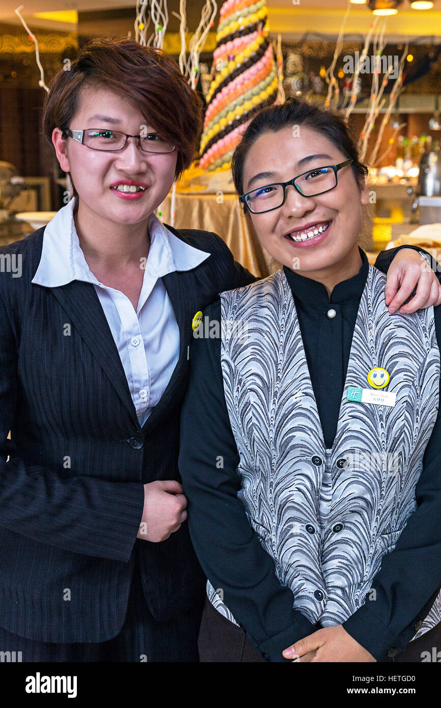 Il personale al cinese hotel, Yinchuan, Ningxia, Cina Foto Stock