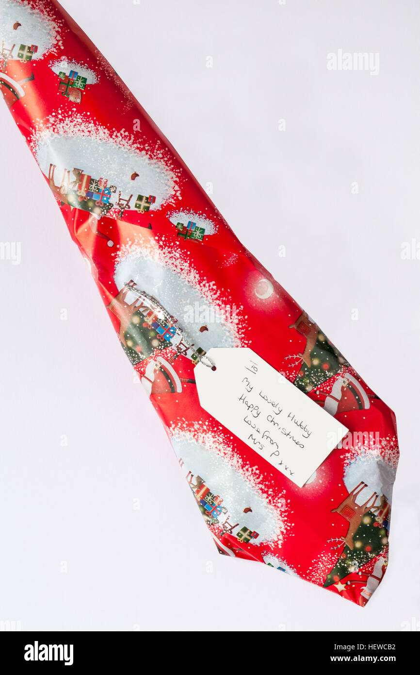 Tag in regalo di Natale cravatta al marito dalla moglie - a mio bel marito felice Natale amore da RA P xxx Foto stock Immagine foto Immagine