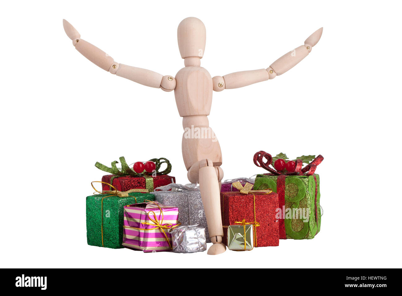 Manichino di legno inginocchiare con il regalo di natale Foto Stock