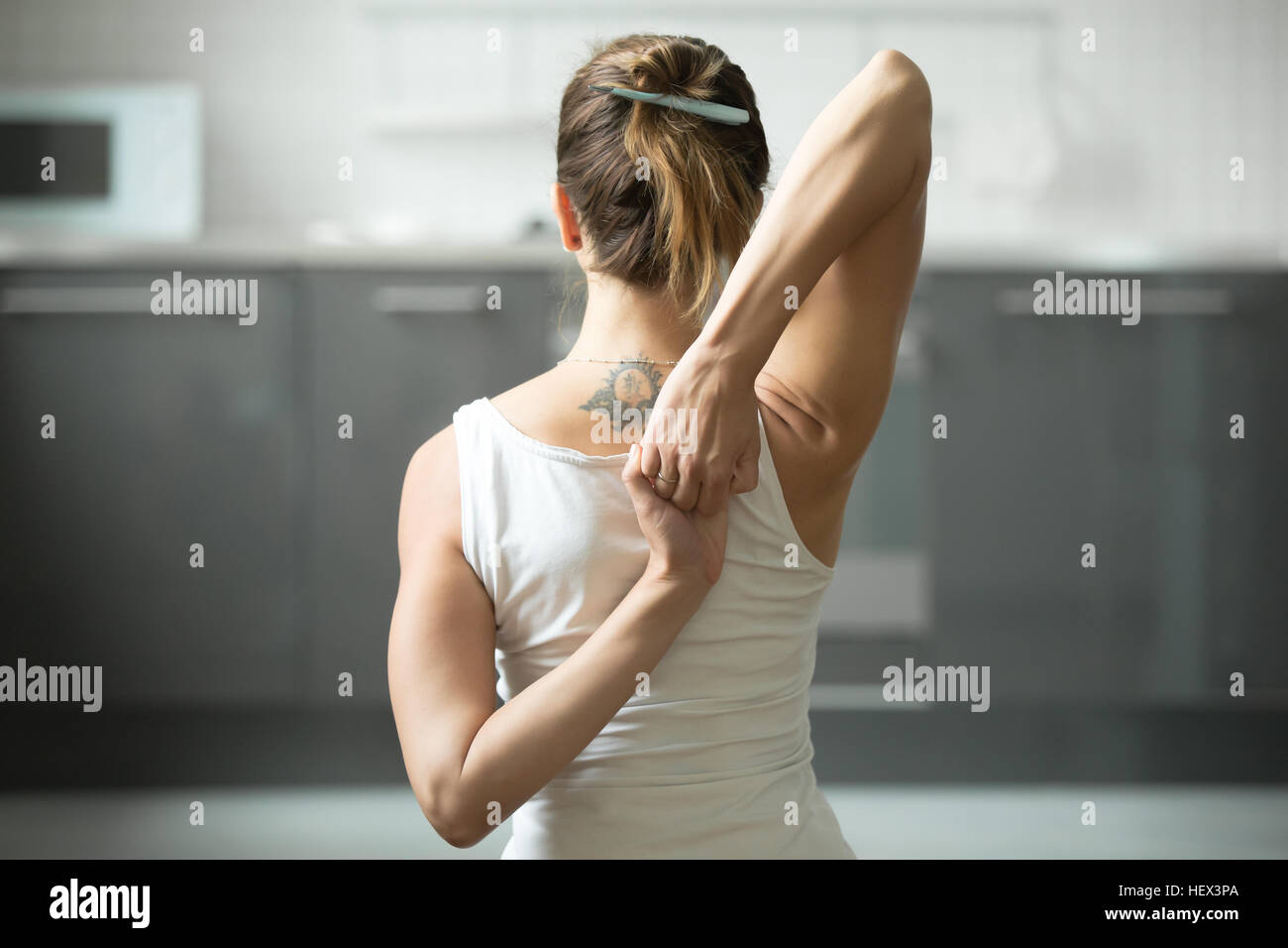 Closeup Gomukasana pongono Foto Stock