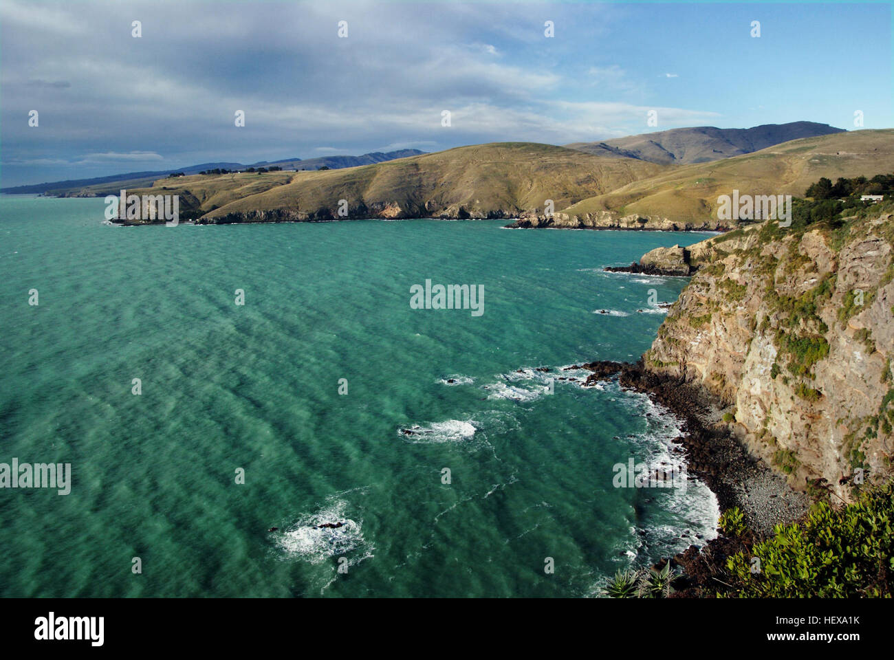La Penisola di Banks, situata sulla costa orientale dell'Isola del Sud in nuova Zelanda, è formata da due vulcani estinti. Il suo punto più alto, l'Herbert Peak, si innalza per 3.014 metri. La penisola comprende i porti di Lyttelton e Akaroa, creati dall'invasione e dall'erosione post-glaciale del mare. Foto Stock