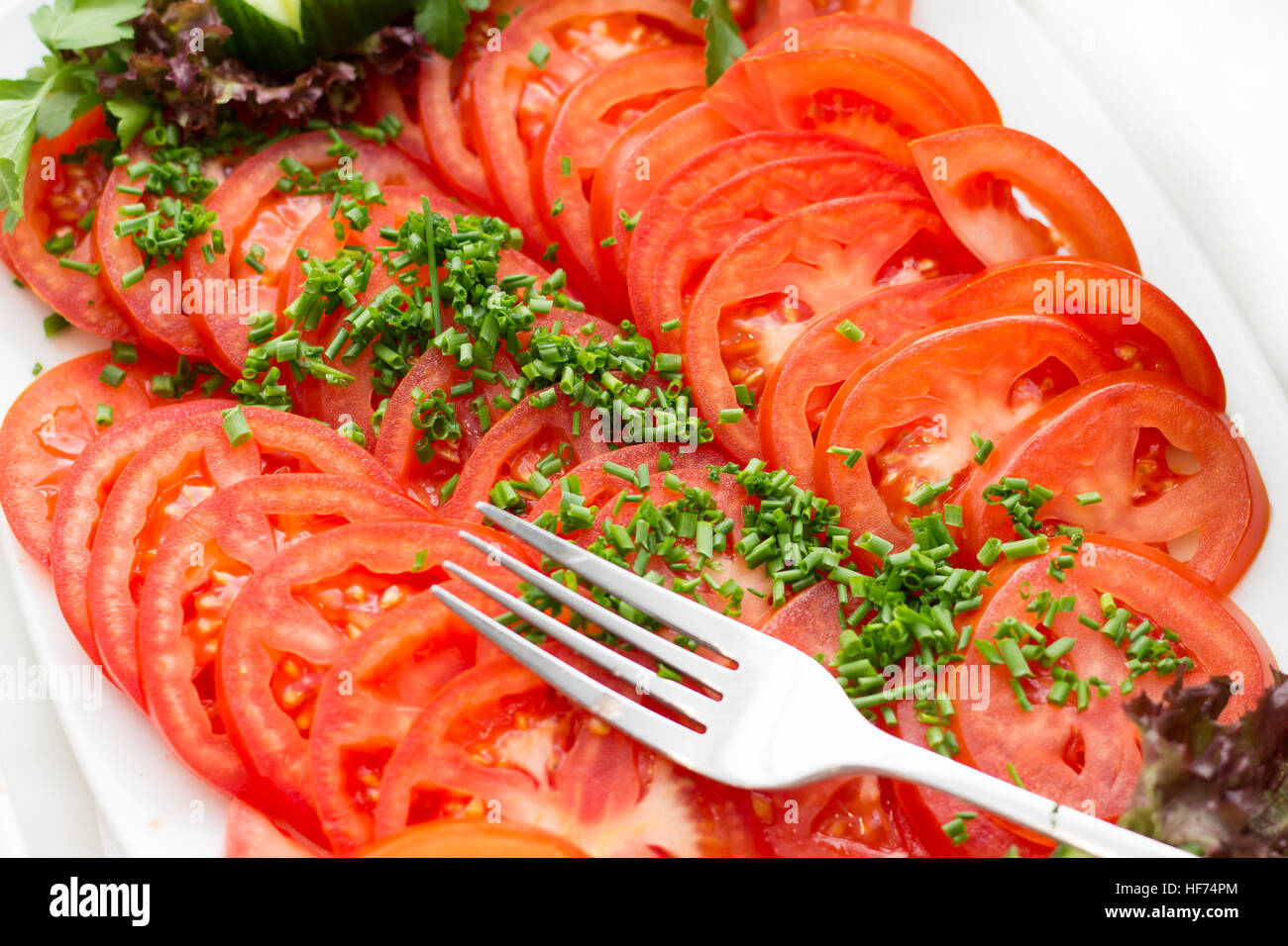 Piatto con freschi pomodori a fette. Foto Stock