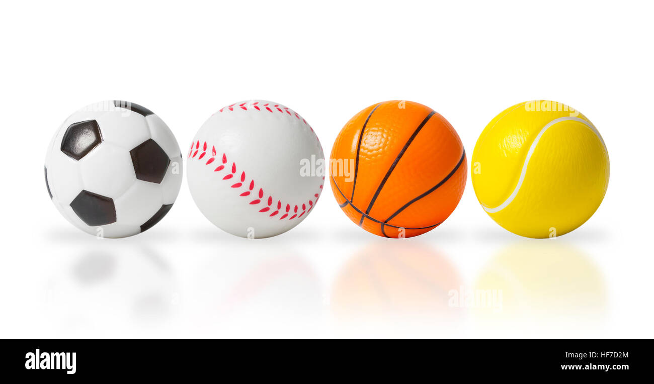 4 piccole palle sportive isolato su bianco Foto Stock
