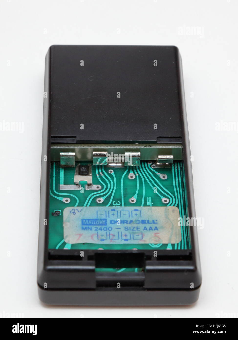 Sinclair Cambridge calcolatore elettronico che mostra la parte inferiore del vano della batteria / camera e contatti Foto Stock
