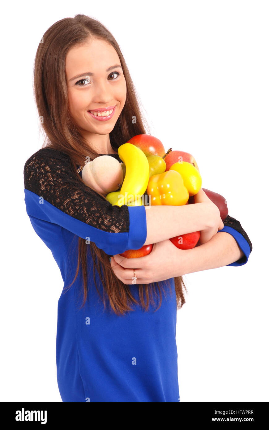 Bambini tiene in mano un frutto isolato su bianco Foto Stock